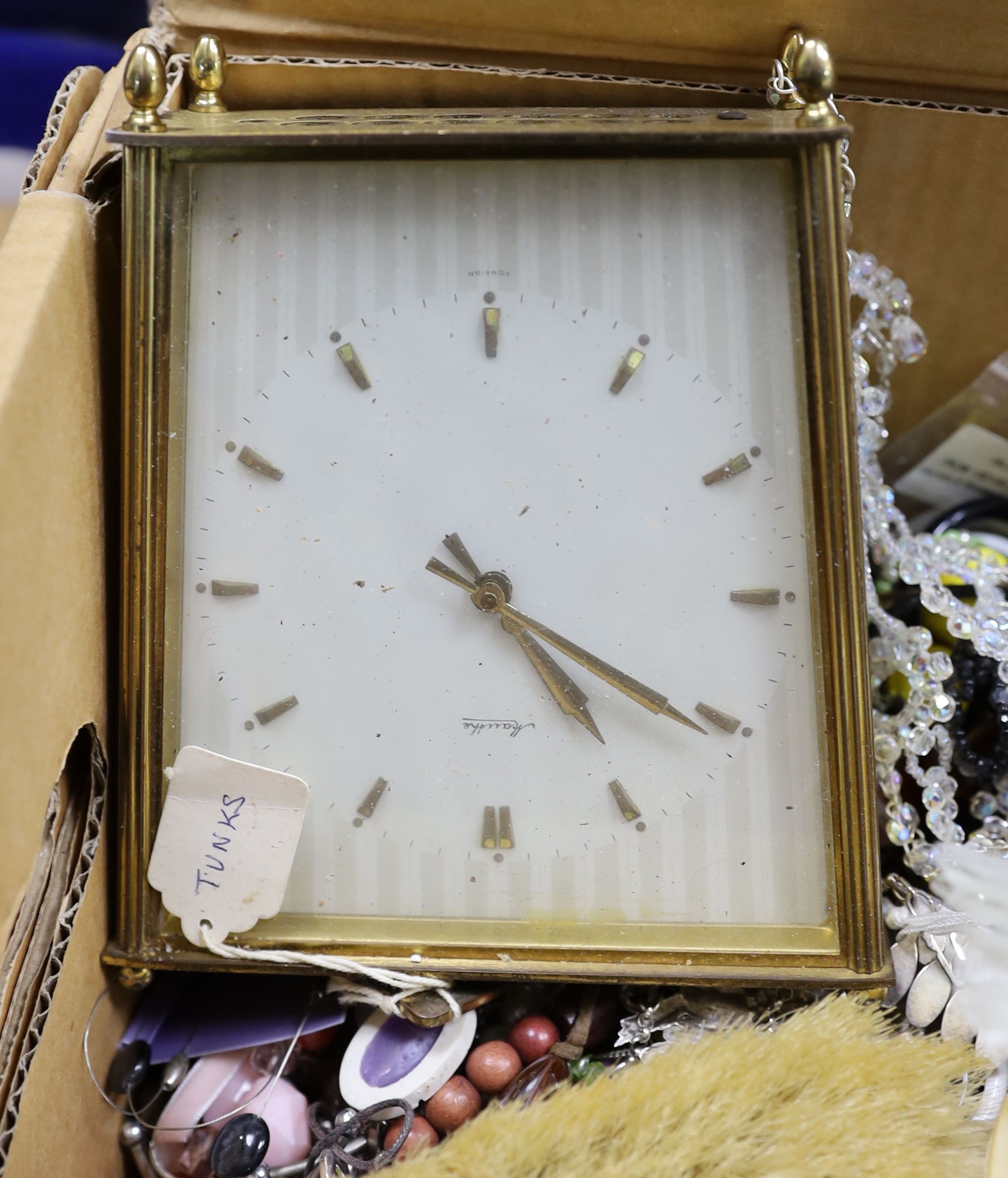 A large quantity of costume jewellery, clocks, watches, dressing table brushes etc.